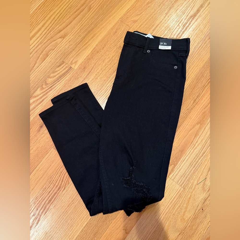 Black distressed super skinny high rise jeans